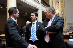 Senator Morgan McGarvey (center), D-Louisville, discusses legislation facing the 2016 Kentucky General Assembly with Senate colleagues today during a brief recess. Legislators could be voting on bills on the Senate floor as early as Thursday of this week. 
