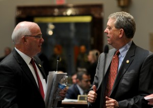 Senator Dorsey Ridley, D-Henderson (right), speaks with Senator Dennis Parrett, D-Elizabethtown, during a recess period in the Kentucky Senate. 