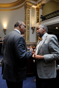 Senator Reginald Thomas (left), D-Lexington, and Senate Democratic Caucus Chair Gerald A. Neal, D-Louisville, step away from their desk to talk about issues facing the 2016 Kentucky General Assembly. Today marks the 6th legislative day of the 60-day session. 