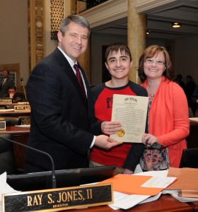 Senate Democratic Floor Leader Ray S. Jones II (left), D-Pikeville, on Feb. 23 honored Blake Edmonds on the floor of the Kentucky State Senate for his service on behalf of Kentuckians living with epilepsy. Blake has been selected by the Epilepsy Foundation of Kentuckiana to join 40 other youth from across the United States as participants in the national Epilepsy Foundation’s 2016 Teen Speak Up! Program in Washington, D.C. in April 2016. Blake was joined in Frankfort today by his mother, Diane Edmonds. 